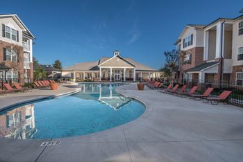 Resort style pool with sun deck